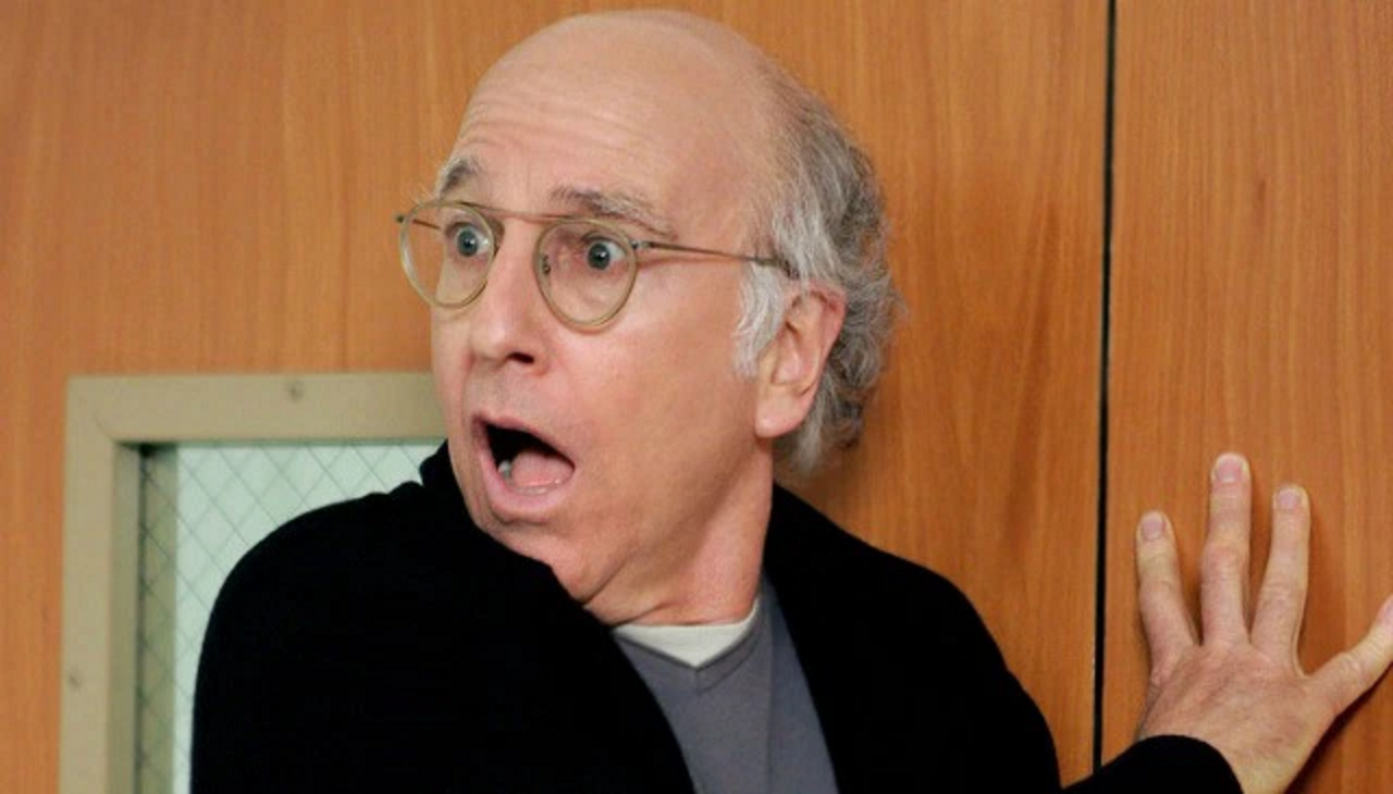 Larry David Trapped in Revolving Door, Crowd Gathers